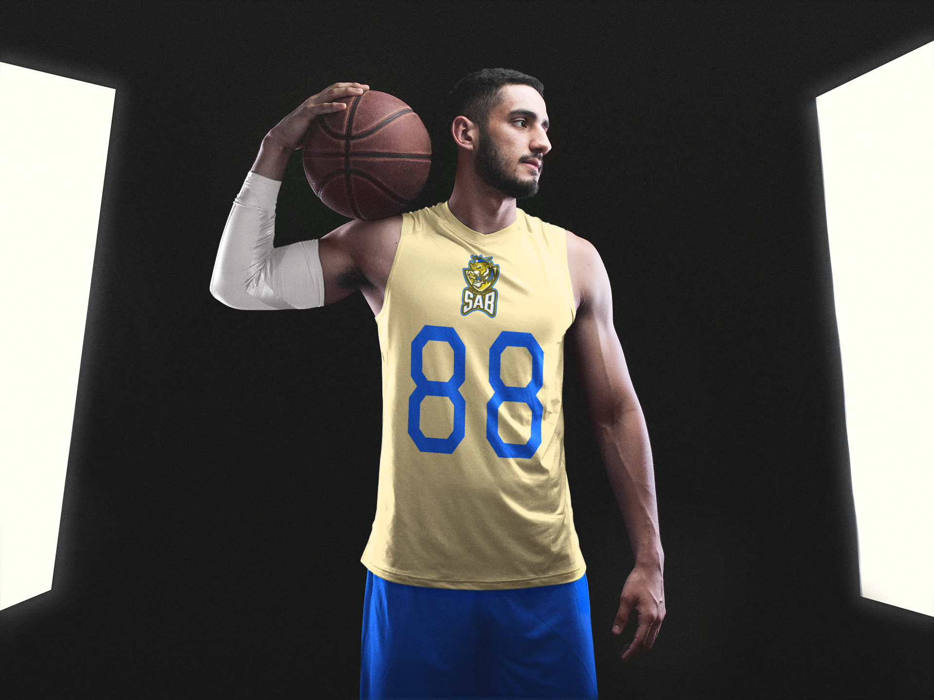 basketball-jersey-maker-bearded-man-with-muscles-standing-between-lights-a16354