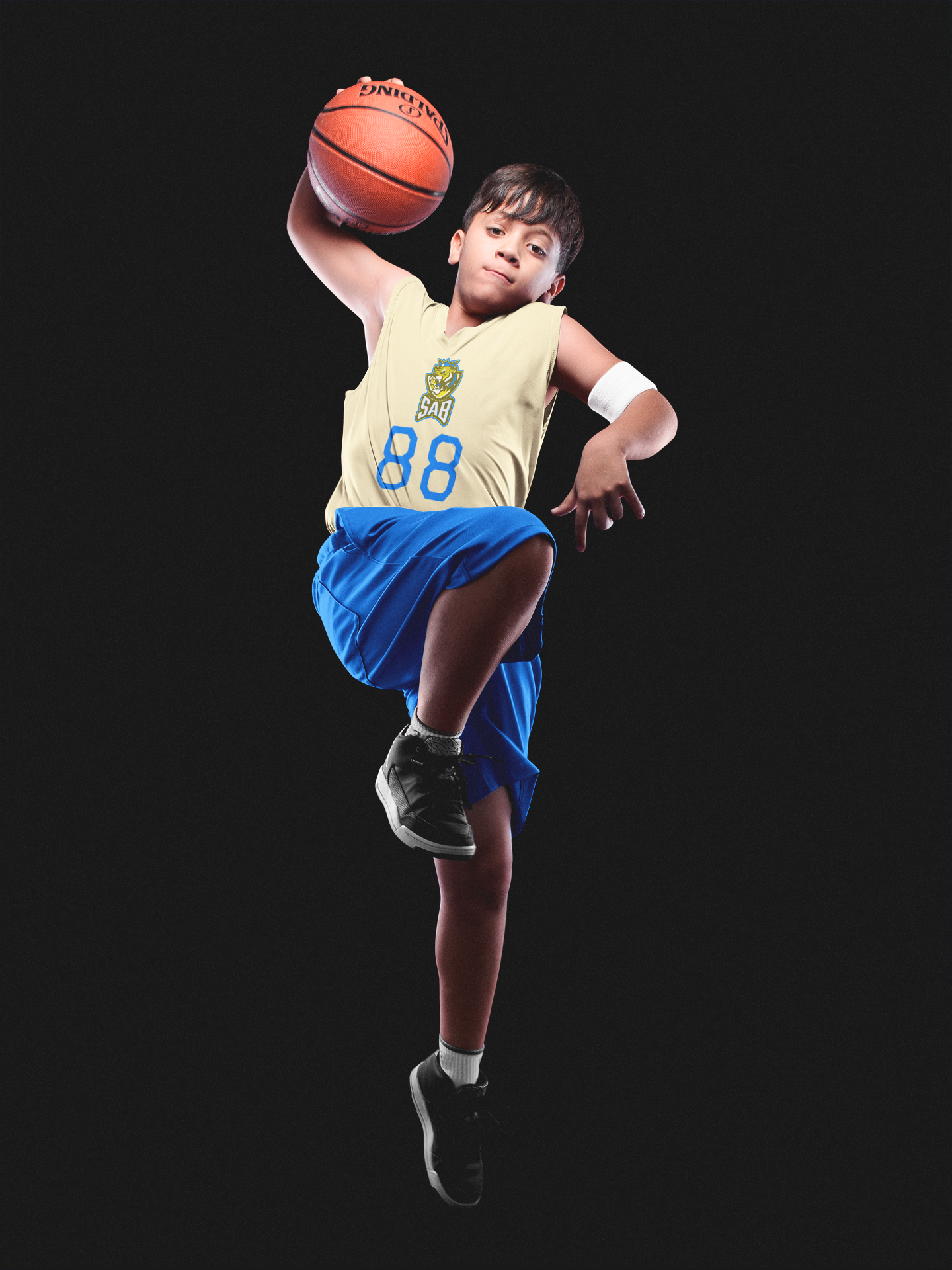 basketball-jersey-maker-boy-doing-tricks-at-the-studio-a16636